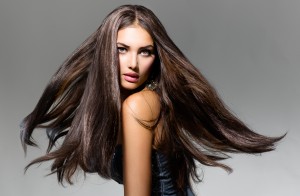 Fashion Model Girl Portrait with Long Blowing Hair. Glamour Bea